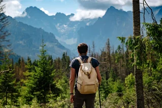 man hiking in the mountains